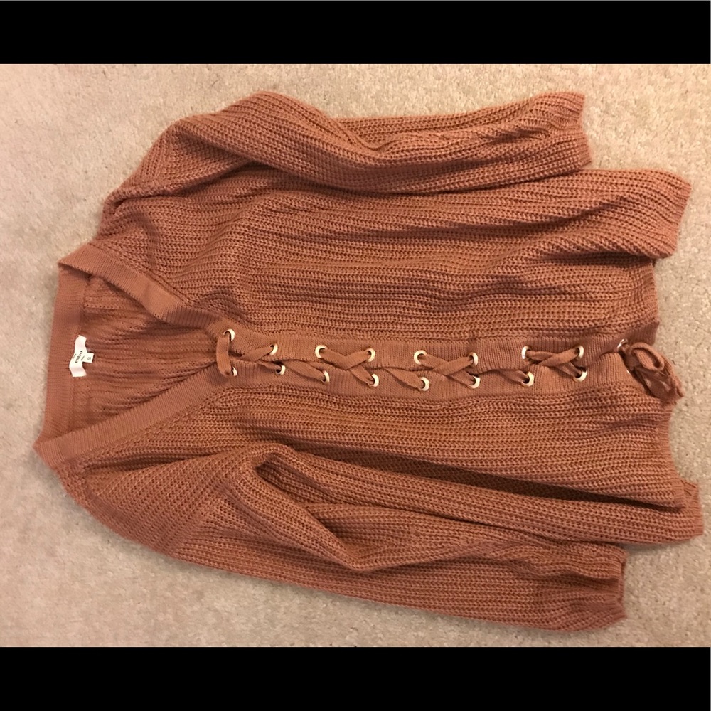 Rust orange sweater with lace up detailing